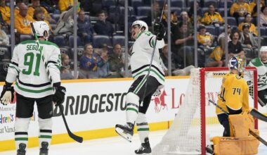 Dallas Stars left wing Mason Marchment, center, celebrates his goal with center Tyler Seguin (91) during the first period of an NHL hockey game against the Nashville Predators, Wednesday, April 16, 2025, in Nashville, Tenn. (AP Photo/George Walker IV)