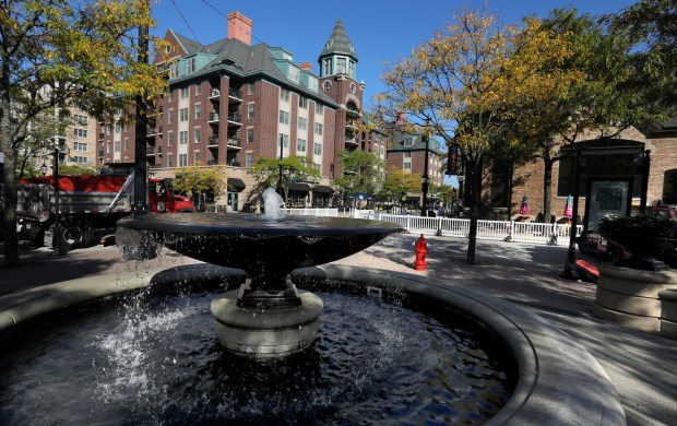 Downtown Arlington Heights features a small park, condos, retail shopping...