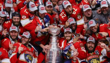The Florida Panthers pose with the cup for a team photo after winning game seven of the 2024 Stanley Cup Final against the Edmonton Oilers at Amerant Bank Arena.