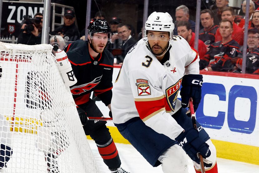 Florida Panthers' Seth Jones (3) moves the puck in front of Carolina Hurricanes' Andrei...