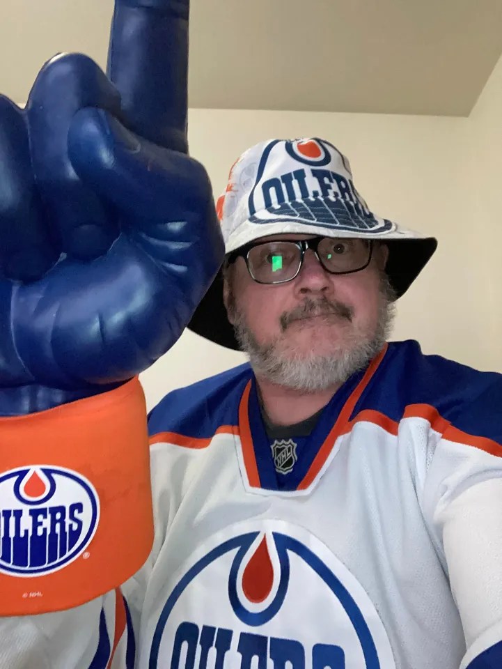 "Hardcore Superfan Mr Jones," wrote Dave Brothers, who sent this photo. "Note: Extreme 15 flags on vehicle," he added. (See below.)