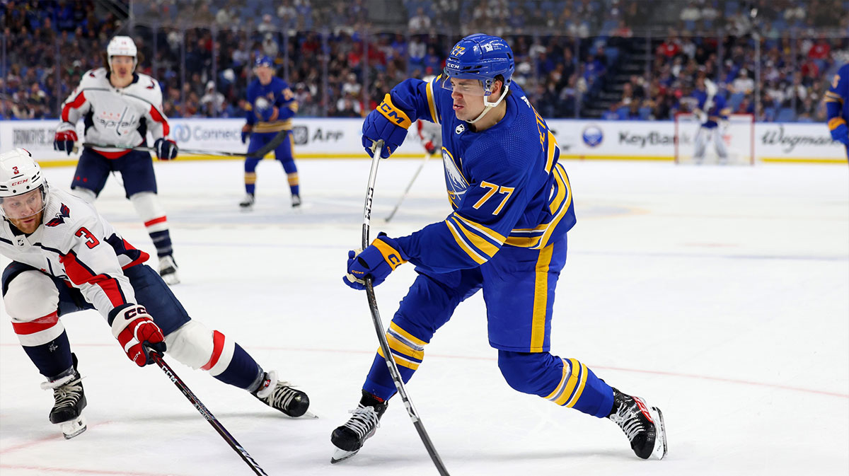 Washington Capitals defenseman Nick Jensen (3) tries to block a shot by Buffalo Sabres right wing JJ Peterka (77) during the second period at KeyBank Center.