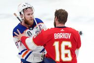 FILE - Edmonton Oilers forward Connor McDavid (97) congratulates Florida Panthers forward...