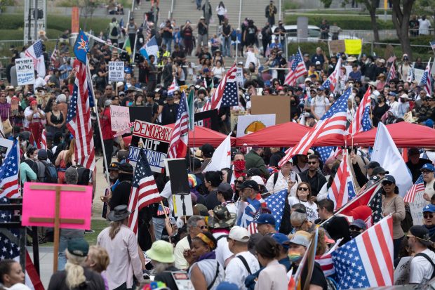 Thousands of No Kings protesters marched against the policies of...