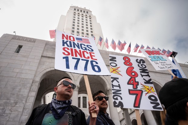 Thousands of No Kings protesters marched against the policies of...