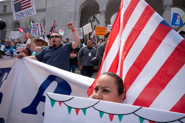 Thousands of No Kings protesters marched against the policies of...