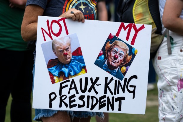 Thousands of No Kings protesters marched against the policies of...