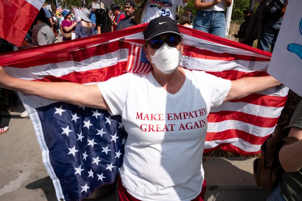 Thousands of No Kings protesters marched against the policies of...