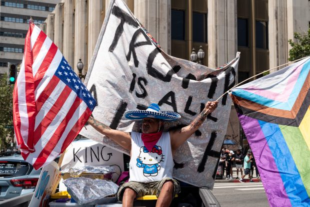 Thousands of No Kings protesters marched against the policies of...
