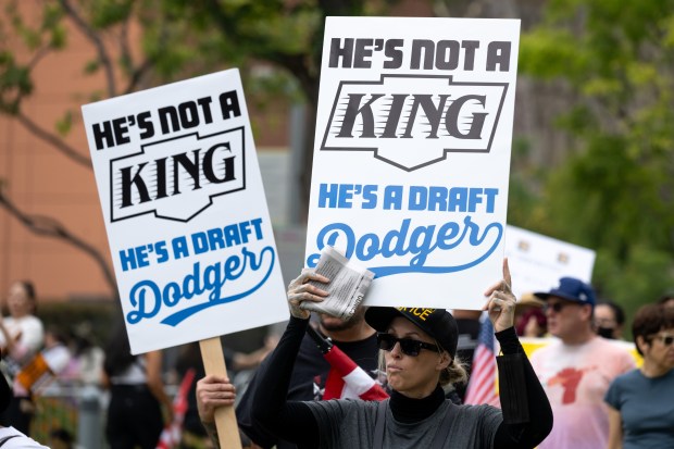 Thousands of No Kings protesters marched against the policies of...