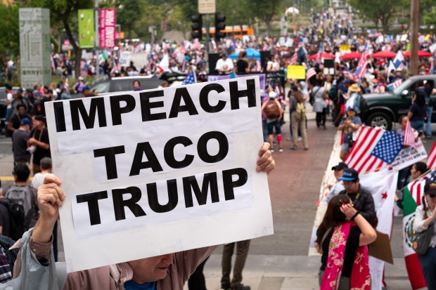 Thousands of No Kings protesters marched against the policies of...