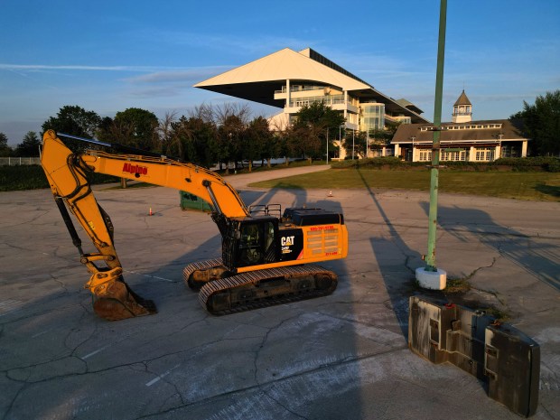 Construction equipment stands ready for expected demolition at the former...