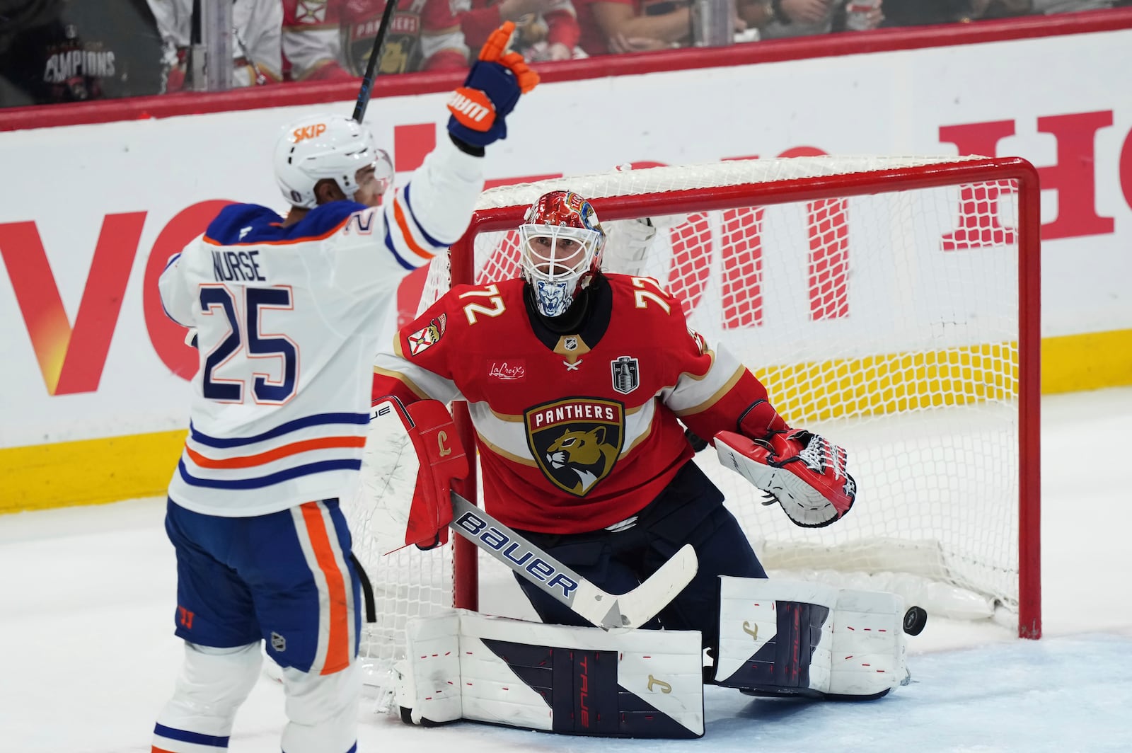 Edmonton Oilers' Darnell Nurse (25) scores on Florida Panthers goalie Sergei Bobrovsky (72) during the second period in Game 4 of the NHL hockey Stanley Cup Final in Sunrise, Fla., Thursday, June 12, 2025. (Nathan Denette/The Canadian Press via AP)