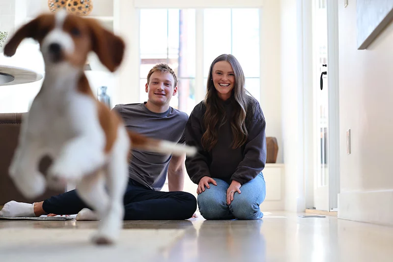 Presley’s puppy energy and early-morning hours have led to slight adjustments in Cale’s sleep habits. 