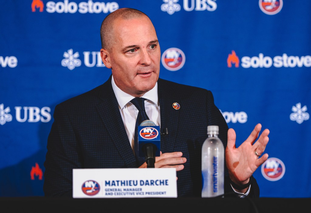 Islanders GM Mathieu Darche talks to reporters during his introductory press conference.