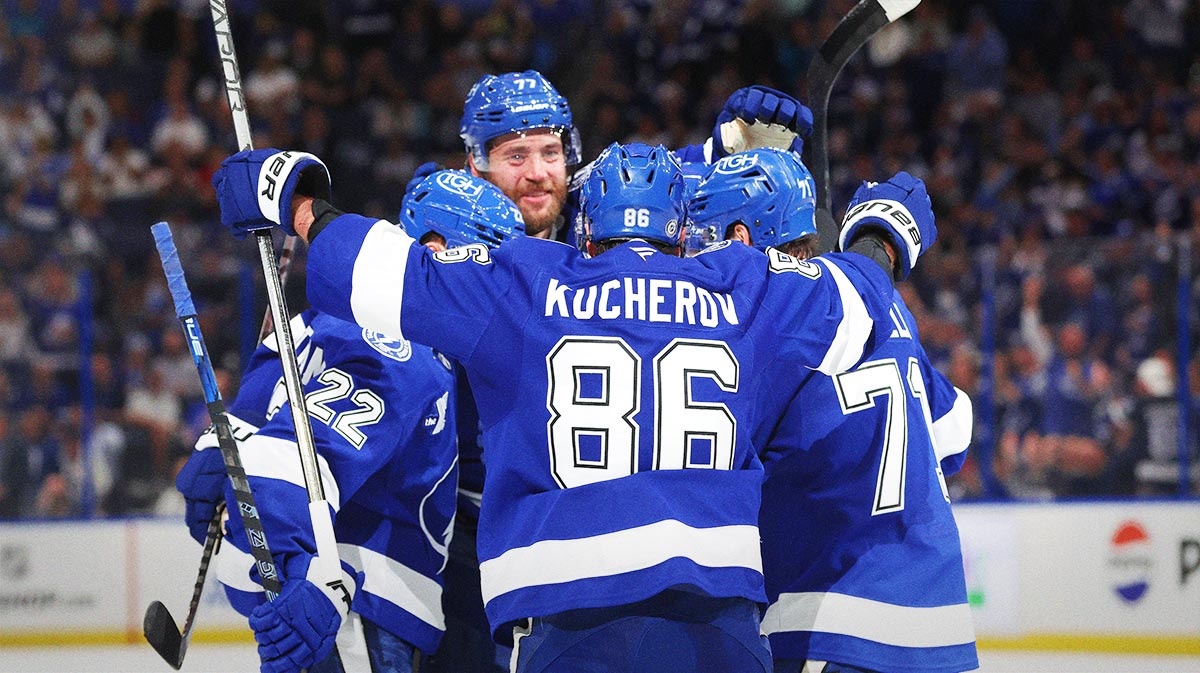 Tampa Bay Lightning defenseman Victor Hedman (77) is congratulated by right wing Oliver Bjorkstrand (22), right wing Nikita Kucherov (86) and center Anthony Cirelli (71) after he scored a goal against the Toronto Maple Leafs during the third period at Amalie Arena.
