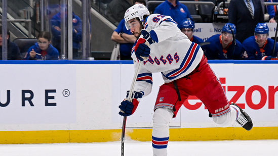 New York Rangers center Mika Zibanejad (93) attempts a shot against the New York Islanders.(IMAGN IMAGES via Reuters Connect)