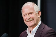 Dallas Stars general manager Jim Nill smiles as he talks with reporters after a practice...