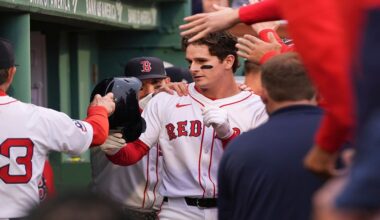 Boston Red Sox rookie Roman Anthony is congratulated after his two RBI double, his first major league hit, after the first inning of a baseball game against the Tampa Bay Rays at Fenway Park, Tuesday, June 10, 2025, in Boston. (AP Photo/Charles Krupa)