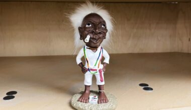 This image provided by the St. Louis Blues via NHL shows Jobu, the doll from the 1989 movie “Major League,” in the locker of the NHL hockey club St. Louis Blues. (Courtesy St. Louis Blues/NHL via AP)