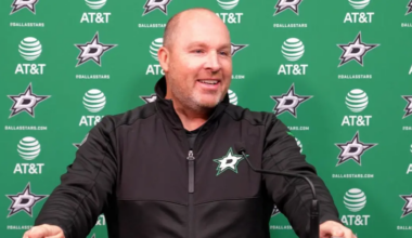 Steve Spott at the podium after a Dallas Stars practice