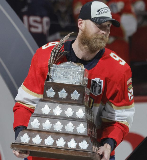 Florida Panthers center Sam Bennett (9) is awarded the Conn Smythe Trophy after Game 6 of the Stanley Cup Final, Tuesday, June 17, 2025, at Amerant Bank Arena in Sunrise, Fla. (Joe Cavaretta/South Florida Sun Sentinel)