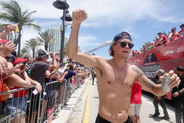 Jesper Boqvist of the Florida Panthers rallies with fans during...