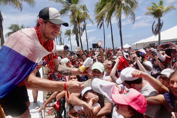 Florida Panthers’ Dmitry Kulikov greets fans along the route of the 2025 Stanley Cup championship parade on Fort Lauderdale Beach on Sunday, June 22, 2025. (Joe Cavaretta/South Florida Sun Sentinel)