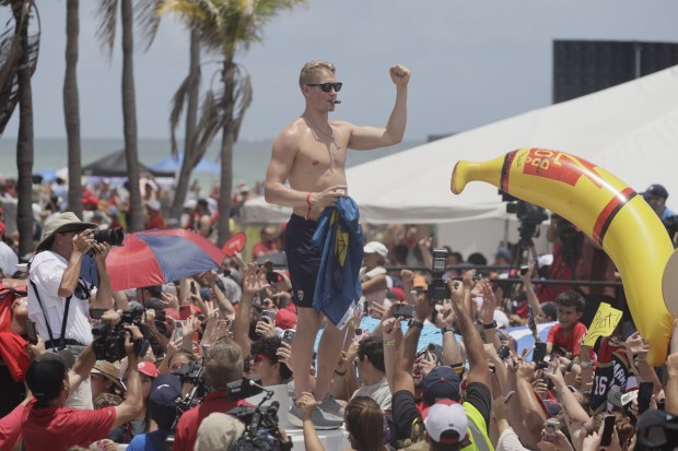 Gustav Forsling of the Florida Panthers is surrounded by fans at the 2025 Stanley Cup championship parade on Fort Lauderdale beach on Sunday, June 22, 2025. (Mike Stocker/South Florida Sun Sentinel)
