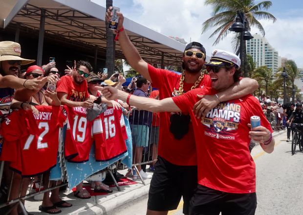 Seth Jones and Carter Verhage of the Florida Panthers celebrate their Stanley Cup championship during the 2025 victory parade on Fort Lauderdale beach on Sunday, June 22, 2025. (Joe Cavaretta/South Florida Sun Sentinel)
