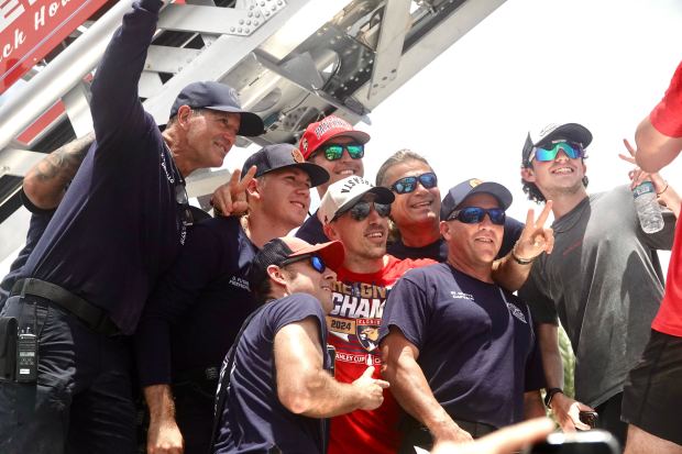 Members of the Fort Lauderdale Fire Rescue join Florida Panthers’...