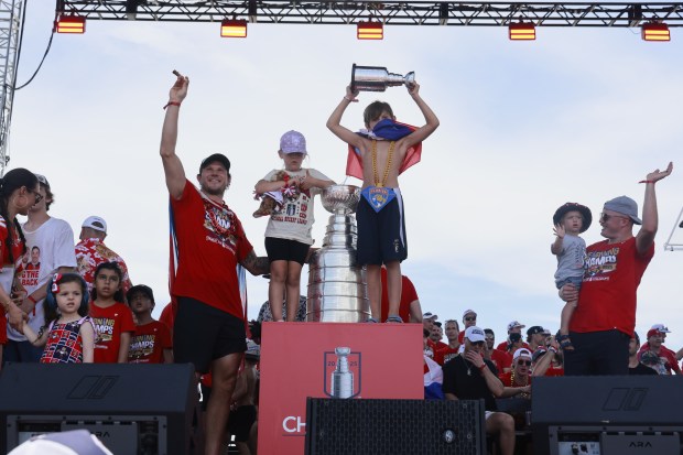 Dmitry Kulikov, left and Nate Schmidt celebrate on the rally...