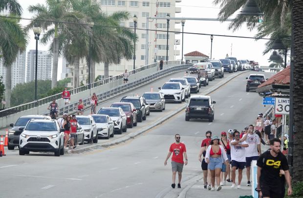 Fans gathered along the route of the Florida Panthers’ Stanley...