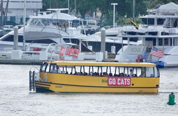 Florida Panthers fans arrive from the Water Taxi to Fort...