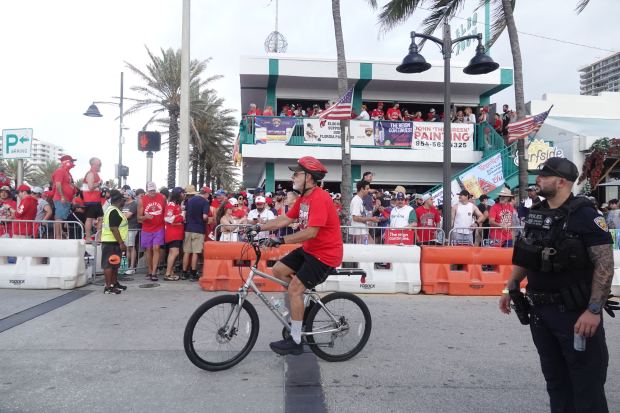 Fans gathered along the route of the Florida Panthers’ Stanley...