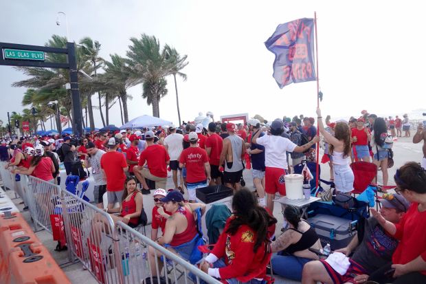 Fans gathered along the route of the Florida Panthers’ Stanley...