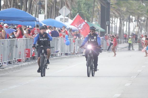 Fans gathered along the route of the Florida Panthers’ Stanley...