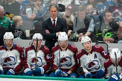 Colorado Avalanche head coach Jared Bednar on the bench during 2025 playoff game.