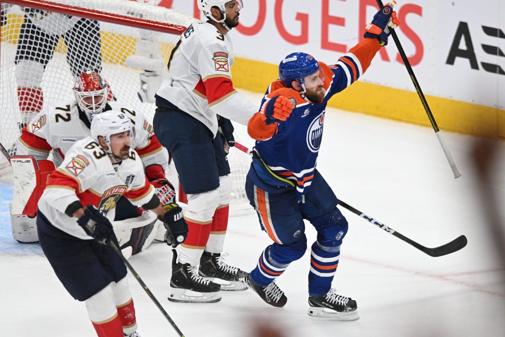 Edmonton Oilers center Leon Draisaitl (29) reacts after scoring the game-winning goal in overtime against the Florida Panthers in game one of the 2025 Stanley Cup Final at Rogers Place. Mandatory Credit: Walter Tychnowicz-Imagn Images