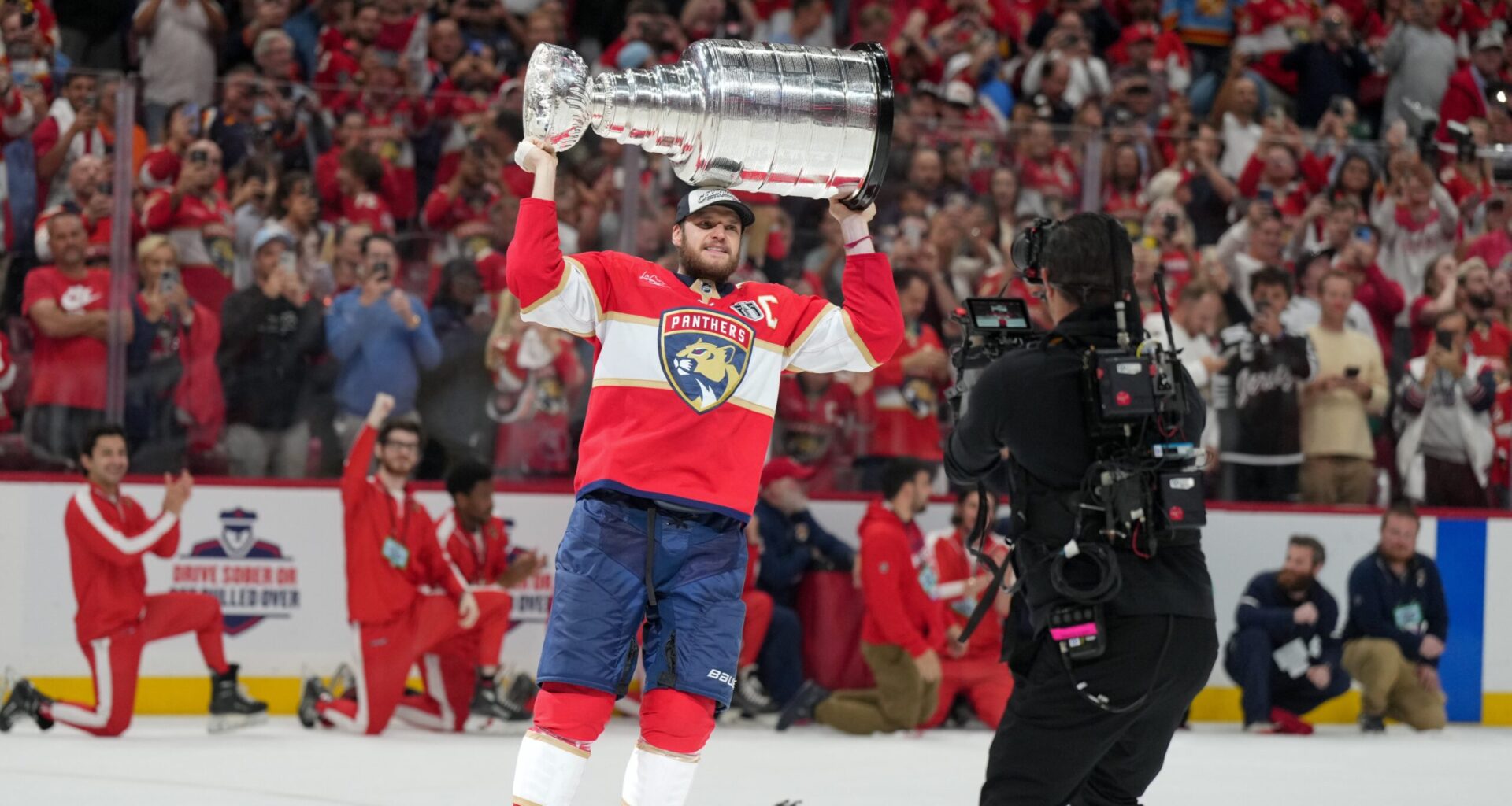 Aleksander Barkov Celebrates Stanley Cup with Navratilova's Wisdom