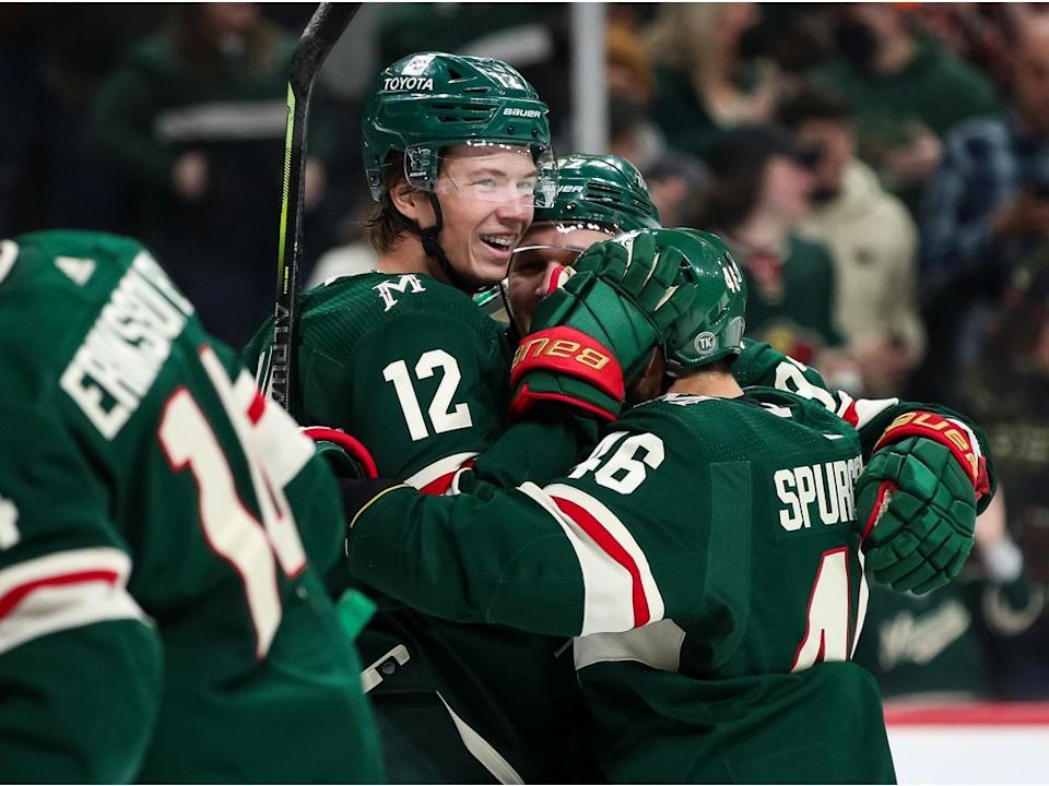  Wild winger Matt Boldy celebrates his power-play goal and first career hat trick Feb. 14, 2022 at St. Paul, Minn.