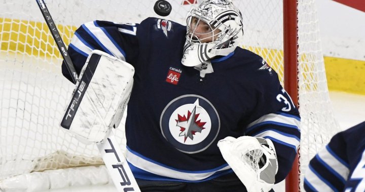 ‘Shocked’: Winnipeg Jets goalie Connor Hellebuyck wins both Hart, Vezina trophies - Winnipeg