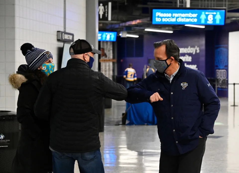 Chris Zimmerman greets fans before a St. Louis Blues game during the COVID-19-affected 2020-21 season.<p> Jeff Curry-Imagn Images</p>