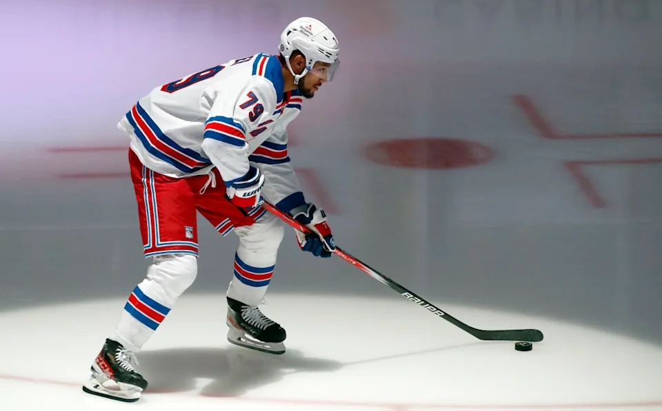 New York Rangers defenseman K'Andre Miller (79) takes the ice to warm up.Charles LeClaire-Imagn Images