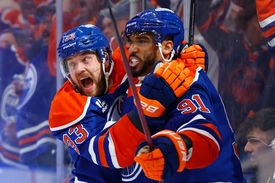 Edmonton Oilers left wing Evander Kane (91) reacts with left wing Viktor Arvidsson (33) after scoring a goal against the Florida Panthers.Perry Nelson-Imagn Images