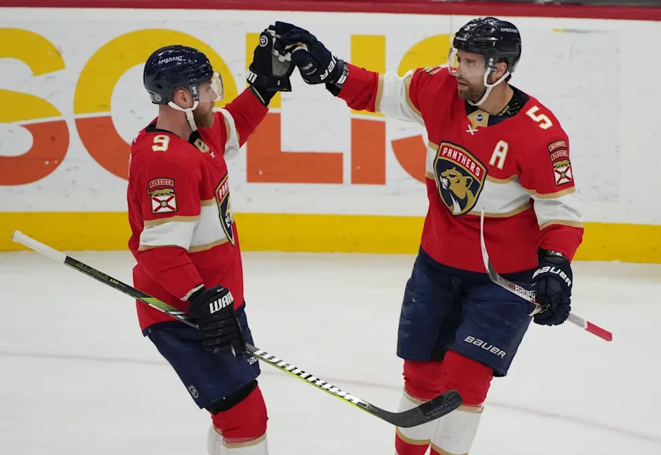 Florida Panthers defenseman Aaron Ekblad (5) celebrates a goal with center Sam Bennett (9) in the second period against the Montreal Canadiens at FLA Live Arena. Jim Rassol-Imagn Images