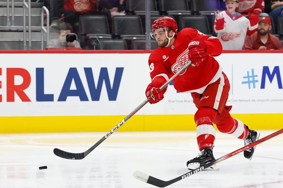 Detroit Red Wings left wing Carter Mazur (43) takes a shot in the second period against the Ottawa Senators at Little Caesars Arena in Detroit on Oct. 4, 2024.