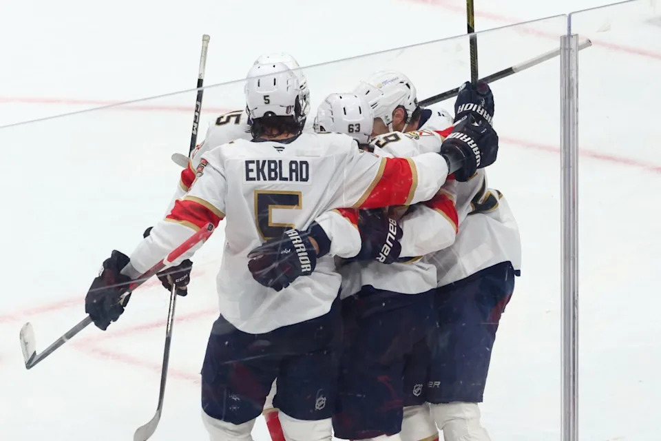 Florida Panthers forward Brad Marchand (63) celebrates scoring wtih defenseman Aaron Ekblad (5) during the first period against the Edmonton Oilers in game five of the 2025 Stanley Cup Final at Rogers...Sergei Belski-Imagn Images