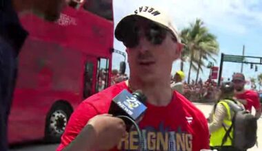 Brad Marchand in the crowd signing autographs at 'Parade of Champions' celebration