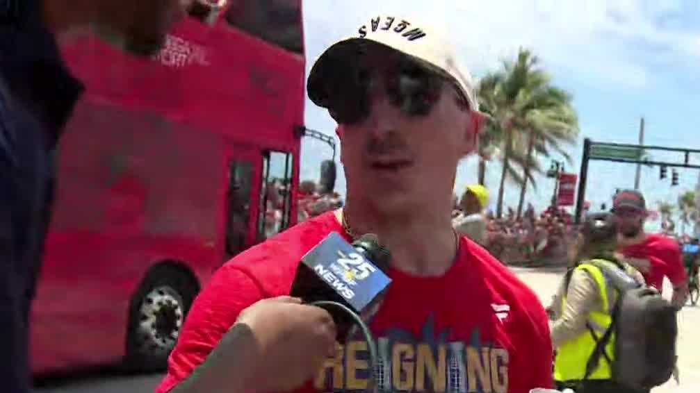 Brad Marchand in the crowd signing autographs at 'Parade of Champions' celebration